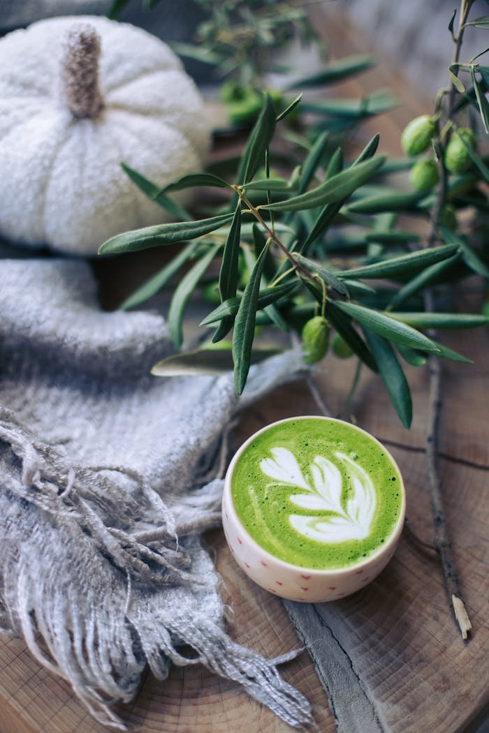 Cozy Autumn Matcha Latte with Olive Branch Decor